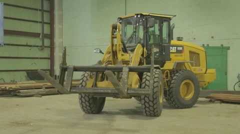 Yellow Loader Moving Steel Beam On Construction Site Stock Footage 46579643