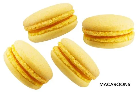 Yellow macaroons on white background Stock Photos