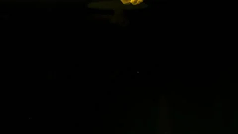 Yellow magic abstraction on black background. Stock Footage 88637043
