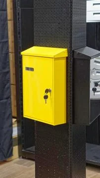 Yellow mail box Stock Photos