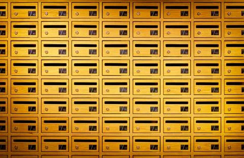 Yellow mail boxes pattern background. Stock Photos