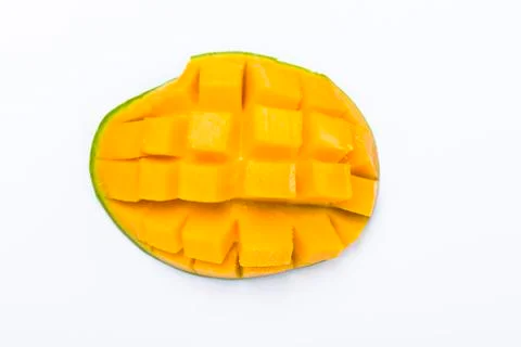 Yellow mango slice cut to cube isolated on white Stock Photos