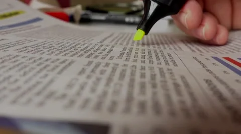 Yellow marking an article Stock Footage 60319380