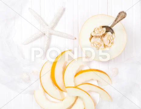 Yellow melon and starfish Stock Photos