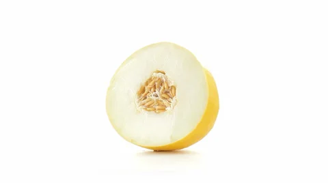 Yellow Melon cut in half side view Vidéo 23728874