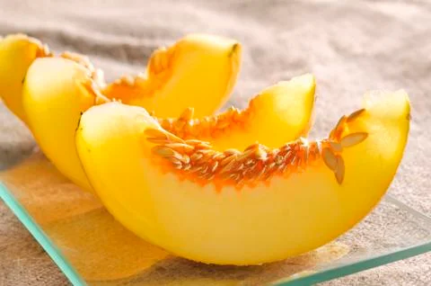 Yellow melon slices Stock Photos