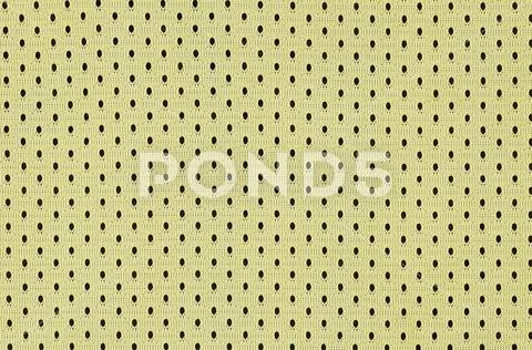 Yellow mesh sport wear fabric textile background pattern Stock Photos