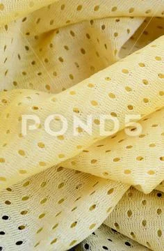 Yellow mesh sport wear fabric textile background pattern Stock Photos