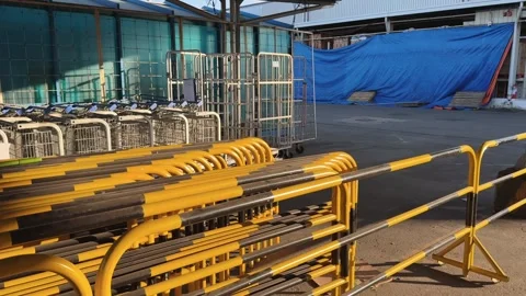 Yellow Metal Crowd Control Barriers Stacked Outdoor Urban Storage after event 库存影片 342782341
