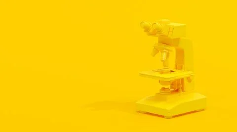 Yellow microscope on yellow background. Space for banner and logo. Stock Photos