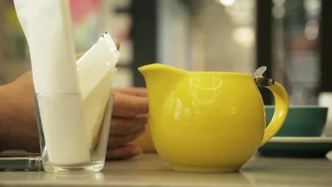Yellow milk jug pitcher streamer frother Stock Footage 185603849