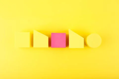 Yellow minimal abstract composition with geometric shapes in a row against Stock Photos