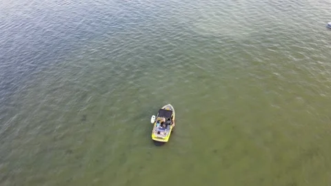 Yellow Momba Sportsboat on Lake Sandbar in Summer 스톡 동영상 154172821