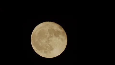Yellow moon in the night sky Stock Footage 116745160