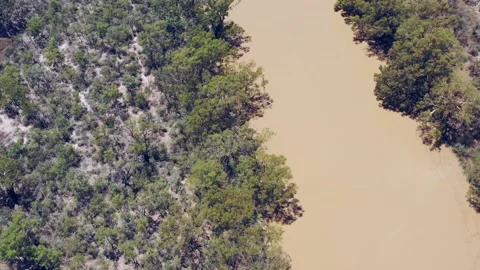 Yellow muddy waters of Darling river in outback of Australia – aerial 4k. Stock Footage 169545464