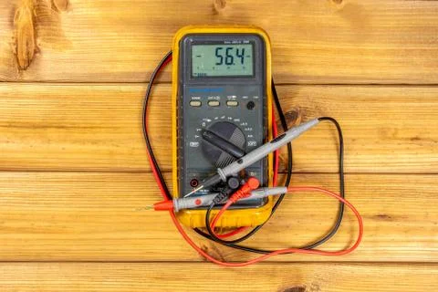 A yellow multimeter, multimeter or multitester is an electronic measuring ins Foto stock