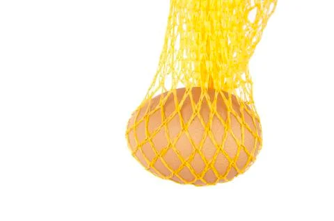 Yellow net with single egg Stock Photos