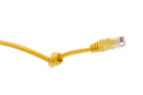 Yellow network computer cable isolated on a white background Foto stock