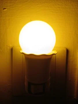 Yellow night light. Suitable for use in the bedroom to dim light and relax Stock Photos