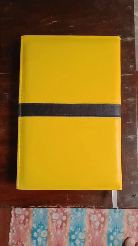Yellow Note book on white Surface stationery Flat Lay Stock Footage 321924778