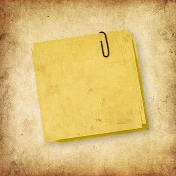 Yellow note over grunge background Stock Illustration