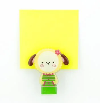 Yellow note pad with sheep clip Stock Photos