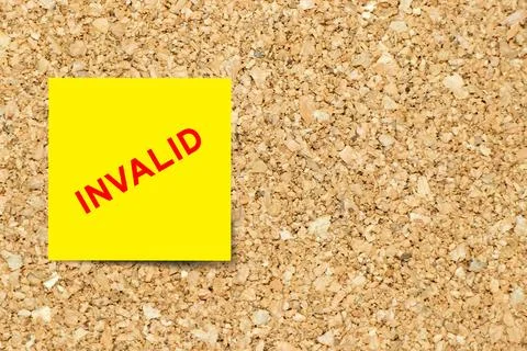 Yellow note paper with word invalid on cork board background with copy space Stock Photos