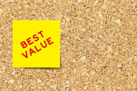 Yellow note paper with word value on cork board background with copy space 스톡 일러스트
