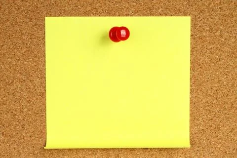 Yellow note with pin . Stock Photos