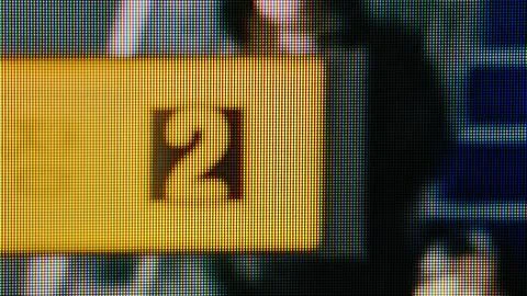 Yellow number 2 on pixels grid display Stock Photos