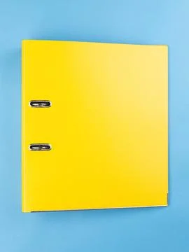 Yellow office folder on blue background. Office Folder Template Stock Photos