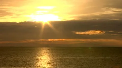 Yellow Orange Evacuating Sun Time lapse Ocean Stock Footage 22159733
