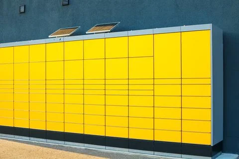 Yellow package post services Stock Photos
