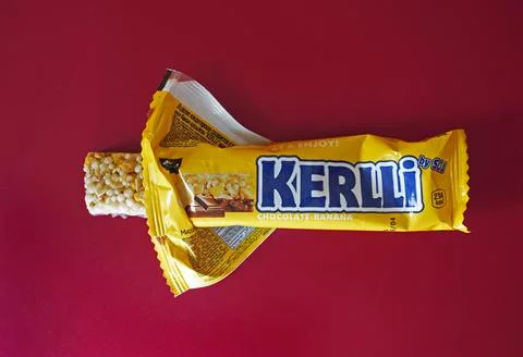 The yellow packaging of the KERLLI bar, the choco.. Stock Photos