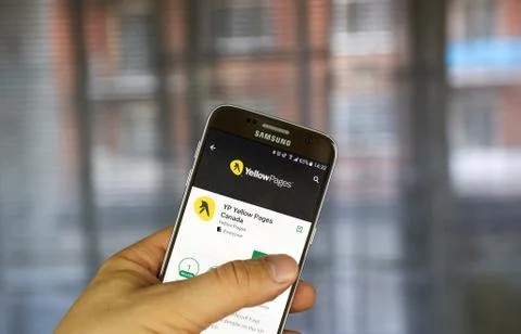 Yellow Pages mobile application. Stock Photos