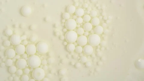 Yellow paint and bubble in motion, abstract background, 4K Stock Footage 277595132