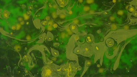 Yellow paint bubbles with green backdrop 스톡 동영상 331097826