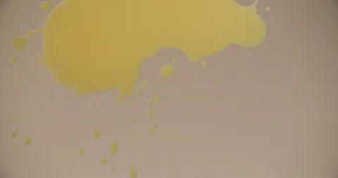 Yellow Paint Ink splash Background abstract  bottom view 4K Stock Footage 103643385