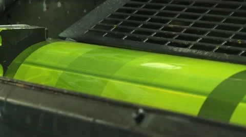 Yellow Paint Running Off a Roller in Printing Press Stock Footage 62348321