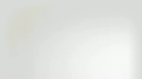 Yellow paint in super slow motion splattering Stock Footage