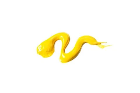 Yellow paint on a white background.  Stock Photos