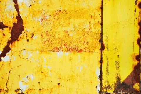 Yellow painted metal with rust texture Stock Photos