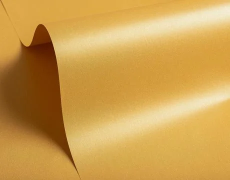 Yellow paper background with a warm gradient and glossy sheen. Smooth and Stock Photos