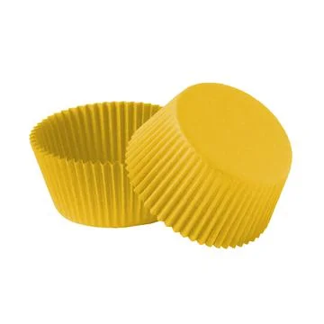 Yellow paper baking forms for muffins and cupcakes Stock Photos