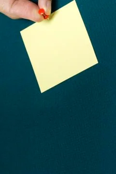 Yellow paper note with pushpin Stock Photos