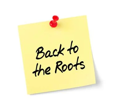 Yellow paper note with text Back to the Roots Yellow paper note with text ... Stock Photos