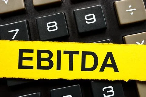 Yellow paper strip on a notepad. EBITDA Earnings before Interest, Taxes Foto stock