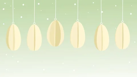 Yellow paper style easter eggs spinning around and hanging on a rope Stock Footage 306152647