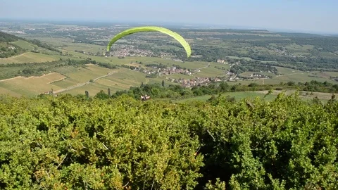 Yellow Para Glider Flying over Burgundy Video stock 76049433