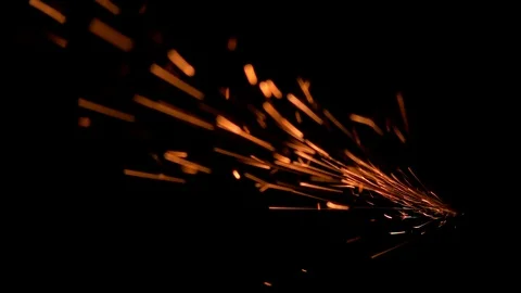 Yellow particles fall in black background to viewer Stock Footage 98497343